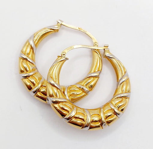 Boucles d'oreilles Créoles vintage en or blanc et jaune 18k 58 Facettes A06930