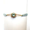 Bracelet Les Petits Acrostiches - Bracelet en or jaune 18k et tourmaline bleu-clair 58 Facettes bracelet-acrostiche-bleu-clair