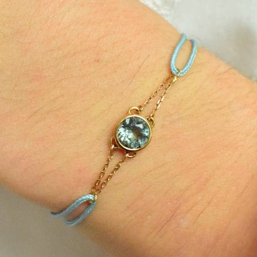 Bracelet Les Petits Acrostiches - Bracelet en or jaune 18k et tourmaline bleu-clair 58 Facettes bracelet-acrostiche-bleu-clair