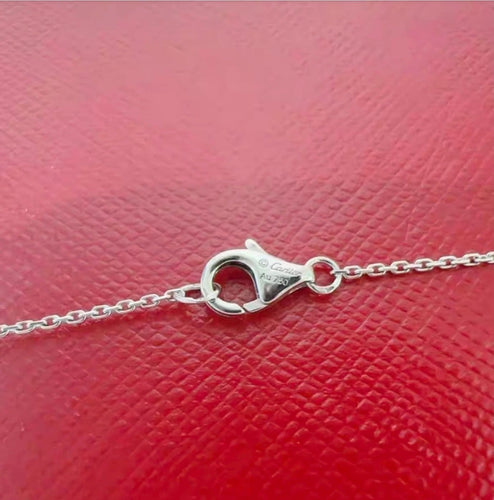 Collier Cartier Panthère - Collier en or blanc 18K, diamants et émeraudes 58 Facettes Jnci10