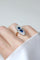 Bague 51 Bague marquise en or jaune 18 kt et platine, saphirs de Ceylan et diamants 58 Facettes
