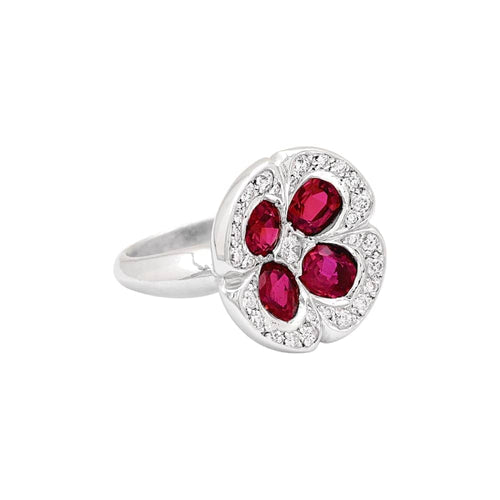 Bague 54 Bague "Fleur", or blanc, rubis synthétiques et diamants. 58 Facettes 35614
