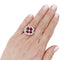 Bague 54 Bague "Fleur", or blanc, rubis synthétiques et diamants. 58 Facettes 35614