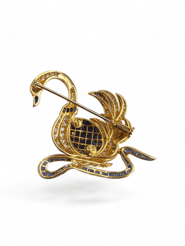 Broche Broche cygne en or jaune 18 carats, diamants et saphirs 58 Facettes broche-0032