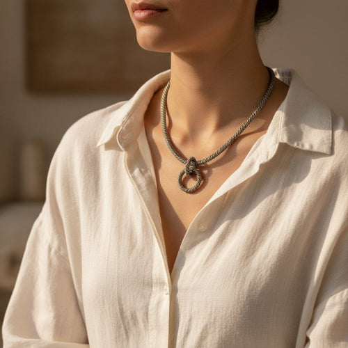 Collier Hermès - Collier vintage en argent à deux anneaux entrelacés 58 Facettes 1.0000900/1