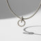 Collier Hermès - Collier vintage en argent à deux anneaux entrelacés 58 Facettes 1.0000900/1