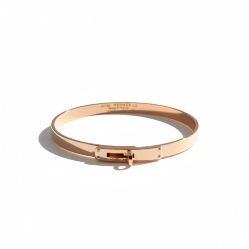 Bracelet Hermès Kelly - Bracelet petit modèle en or rose et diamants 58 Facettes 1.0000733/1