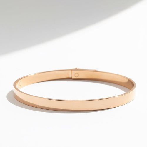 Bracelet Hermès Kelly - Bracelet petit modèle en or rose et diamants 58 Facettes 1.0000733/1