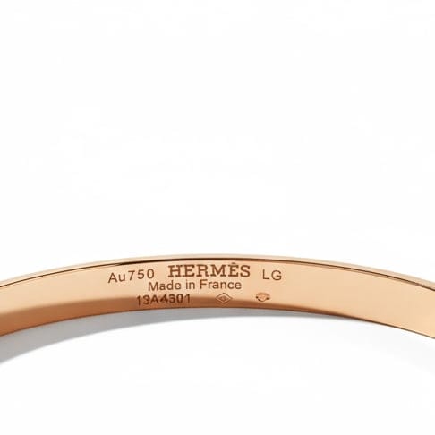 Bracelet Hermès Kelly - Bracelet petit modèle en or rose et diamants 58 Facettes 1.0000733/1