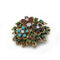 Broche Broche en or jaune 750 avec diamants, rubis, émeraudes, saphirs et turquoises 58 Facettes 1363