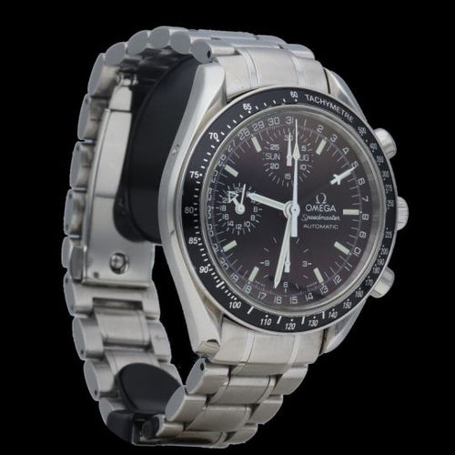 Montre Omega Montre Speedmaster Day Date Chronograph 58 Facettes MT45725