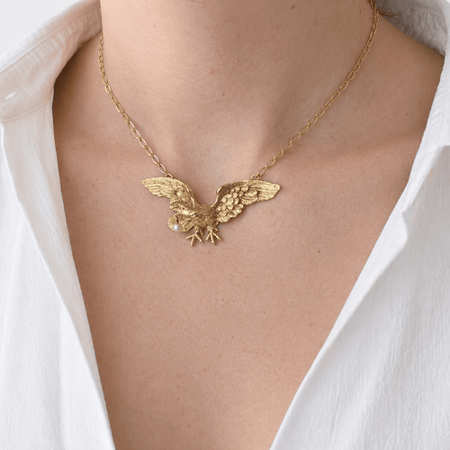 Collier Collier pendentif aigle en or jaune 18 carats et perle 58 Facettes 36164