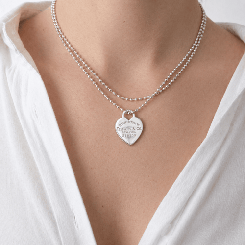 Collier Tiffany & Co. - Collier à pendentif cœur en argent 925 58 Facettes 36236