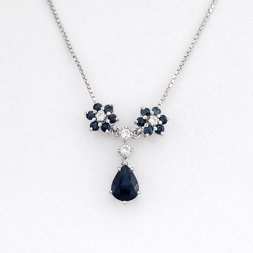 Collier Collier pendentif marguerite en or blanc 18 carats, saphirs et diamants 58 Facettes 36249