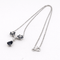 Collier Collier pendentif marguerite en or blanc 18 carats, saphirs et diamants 58 Facettes 36249