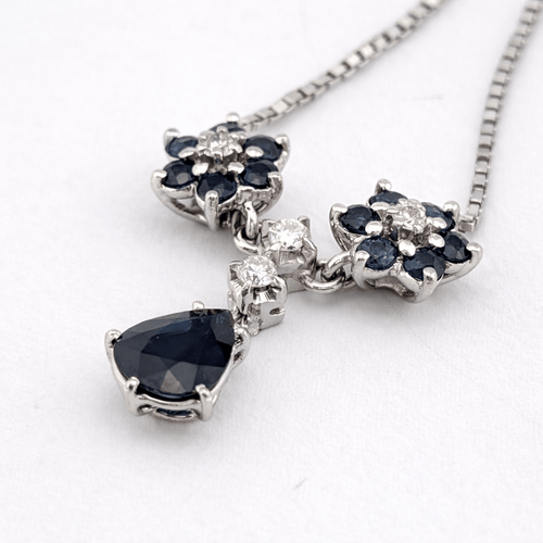Collier Collier pendentif marguerite en or blanc 18 carats, saphirs et diamants 58 Facettes 36249