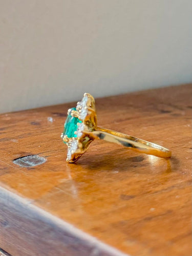 Bague 53 Bague marguerite en or jaune, émeraude et diamants 58 Facettes me
