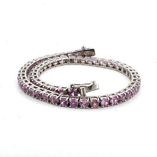 Bracelet Bracelet tennis en platine avec saphirs roses 58 Facettes BR/001