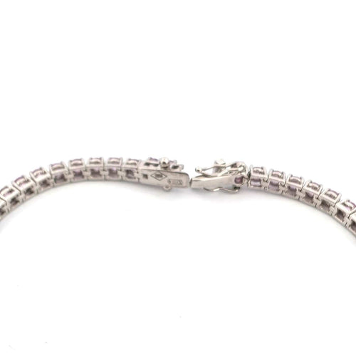 Bracelet Bracelet tennis en platine avec saphirs roses 58 Facettes BR/001