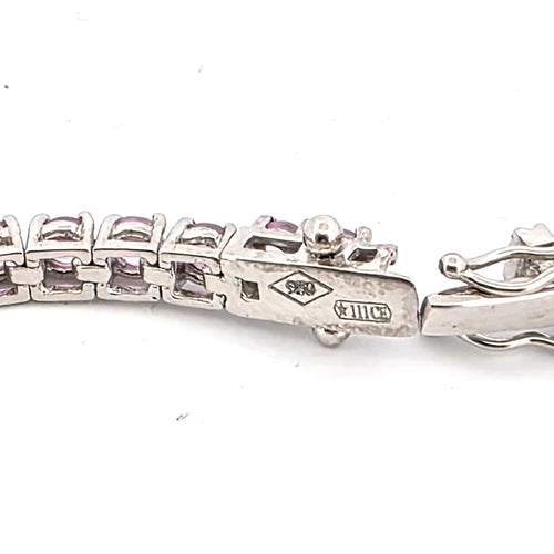 Bracelet Bracelet tennis en platine avec saphirs roses 58 Facettes BR/001
