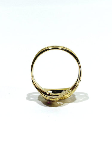 Bague 55.5 Bague serpent en or jaune 18 carats et rubis 58 Facettes id: 1754982