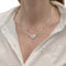 Collier Collier Dinh Van, "Menottes", or blanc, diamants 58 Facettes 35615