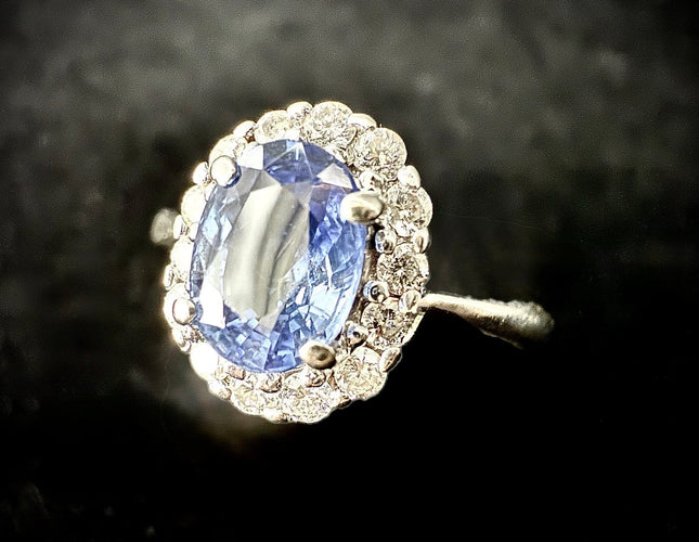 Bague 52 Bague marguerite - Saphir 1,10 ct et diamants en or 18 carats 58 Facettes Bague 001