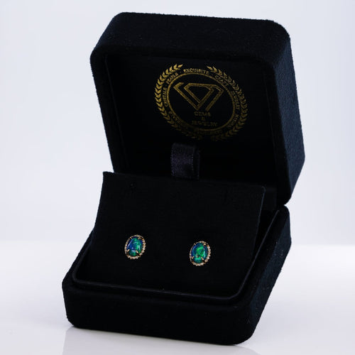 Boucles d'oreilles Boucles d'oreilles en or jaune 18 ct avec opales noires et diamants 58 Facettes E006