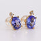 Boucles d'oreilles Boucles d'oreilles en or jaune 18 kt, tanzanites et diamants 58 Facettes E007