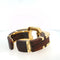 Bracelet David Webb - Bracelet vintage en or jaune 18 K et bois cocobolo 58 Facettes 2.19485
