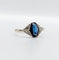 Bague 57 Bague Art déco en or blanc 18k et verre bleu (circa 1920) 58 Facettes A07151