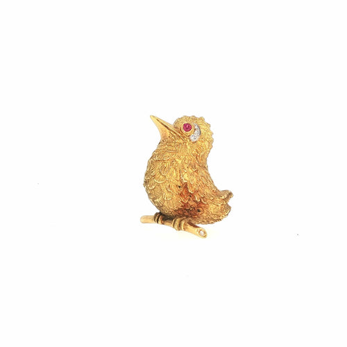 Broche Cartier - Broche oiseau vintage en or jaune 18 carats, rubis et diamants 58 Facettes 2.19476