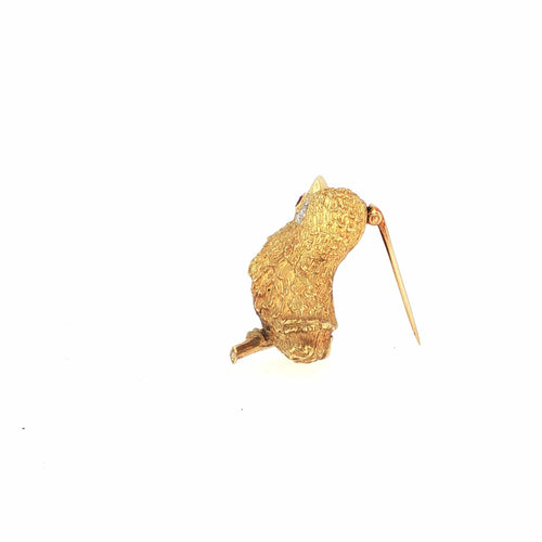 Broche Cartier - Broche oiseau vintage en or jaune 18 carats, rubis et diamants 58 Facettes 2.19476