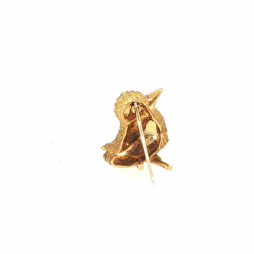 Broche Cartier - Broche oiseau vintage en or jaune 18 carats, rubis et diamants 58 Facettes 2.19476
