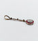 Pendentif Pendentif cible Art déco en or 18k et platine, diamants et rubis synthétiques 58 Facettes A07207