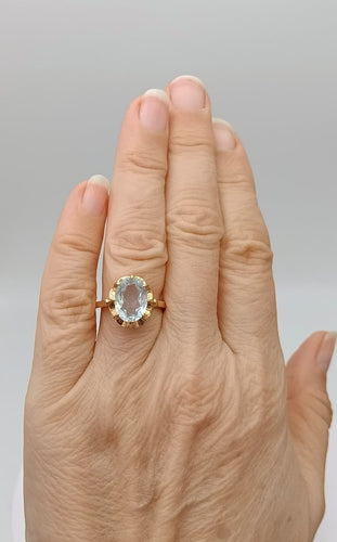 Bague 51 Bague rétro en or jaune 18K sertie d’une aigue-marine ovale 58 Facettes Bordeau/300