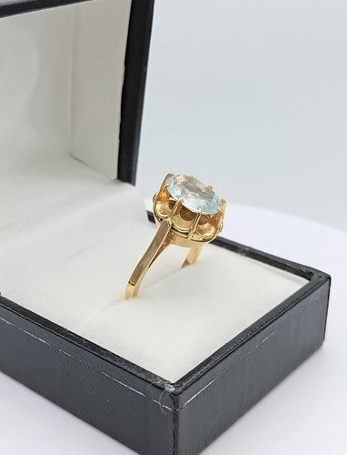 Bague 51 Bague rétro en or jaune 18K sertie d’une aigue-marine ovale 58 Facettes Bordeau/300