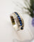 Bague 54 Guy Laroche - Bague bandeau « Ceinture » en or blanc, saphirs et diamants 58 Facettes C2259