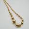 Collier Collier maille boules en or jaune 18k 58 Facettes #sh