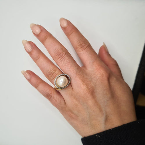 Bague 50 Bague en or jaune 18k avec perle de culture et diamants 58 Facettes #BT