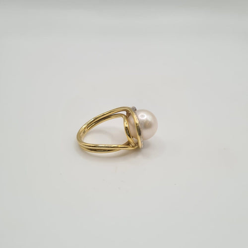 Bague 50 Bague en or jaune 18k avec perle de culture et diamants 58 Facettes #BT