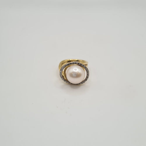 Bague 50 Bague en or jaune 18k avec perle de culture et diamants 58 Facettes #BT