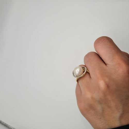 Bague 50 Bague en or jaune 18k avec perle de culture et diamants 58 Facettes #BT