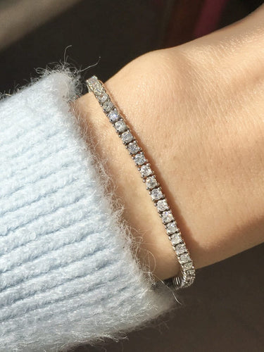 Bracelet Bracelet tennis en platine et diamants taille brillant 3,14 ct 58 Facettes 261