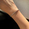 Bracelet AITCHES - Bracelet tennis Embrace en platine diamants 58 Facettes GBT1261PT
