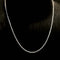 Collier Embrace - Collier tennis en or blanc 18K et diamants 58 Facettes GPD1045WG