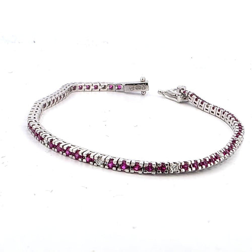 Bracelet Bracelet tennis en or blanc 18 kt avec rubis et diamants 58 Facettes 236 OC