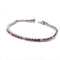 Bracelet Bracelet tennis en or blanc 18 kt avec rubis et diamants 58 Facettes 236 OC