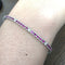 Bracelet Bracelet tennis en or blanc 18 kt avec rubis et diamants 58 Facettes 236 OC