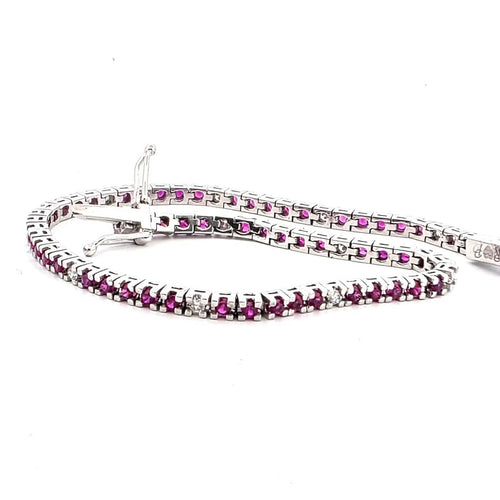 Bracelet Bracelet tennis en or blanc 18 kt avec rubis et diamants 58 Facettes 236 OC